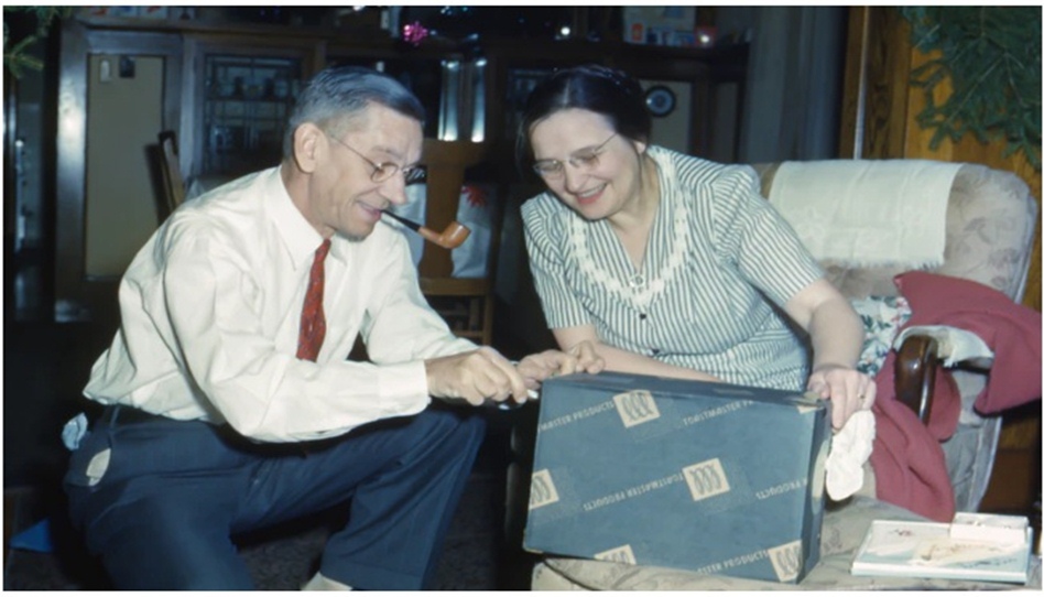 Newlywed Christmas traditions opening gifts