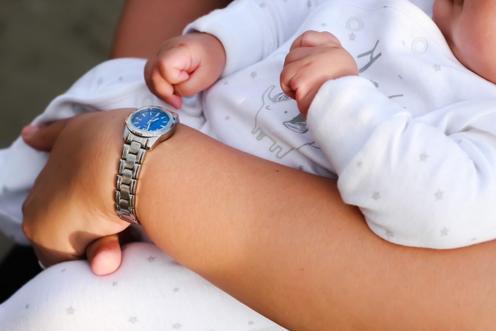 baby in mother's arms