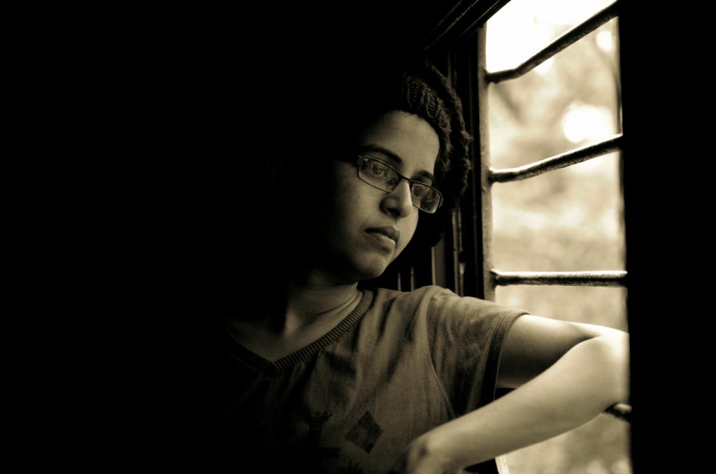 woman looking outside