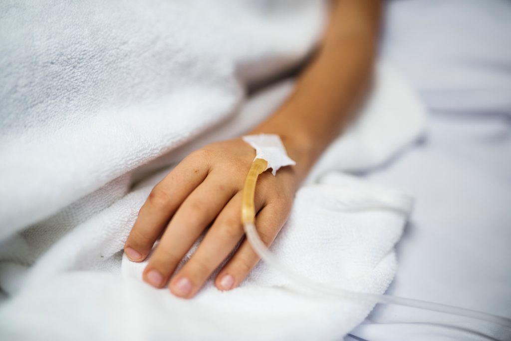 hand with IV line