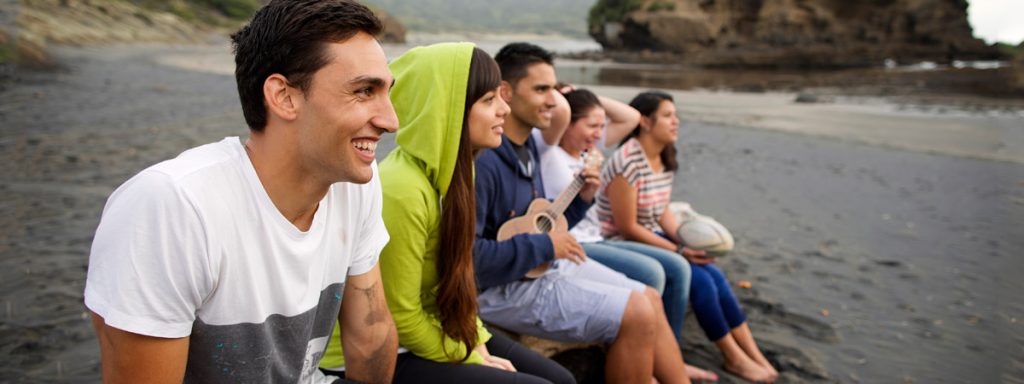 group of young people on the beach