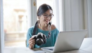 A person studying photography.